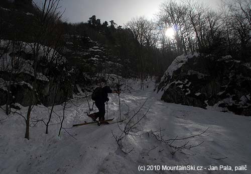 We continued on skis through narrow part between rocks