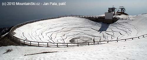 Lake on the summit of Zvoh with water for preparation of artifical snow was  almost empty at the end of April