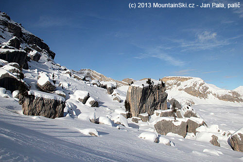 Snow was taken away by wind – a group of shadows just passed stones and rocks, that are usually mostly covered by snow