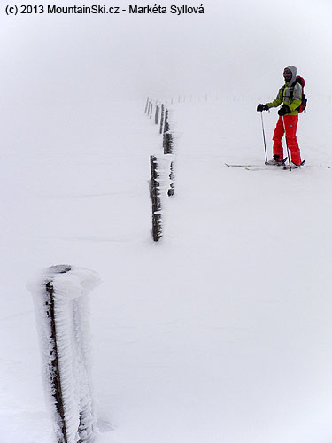 In the pass, probably, we are looking on nice photos in a gudie book – to see mountains, that are probably somewhere around us