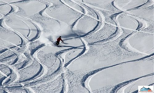 Powder crossing tracks… enthusiastic work of local skiers