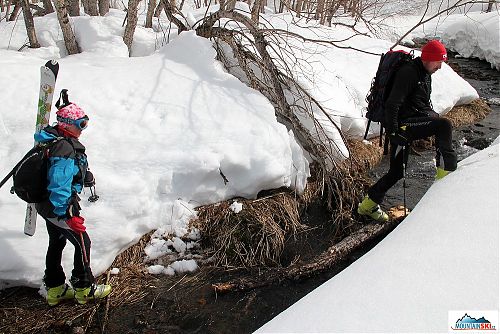 Klára & Pažout during one of water crossing on the way to Bakening