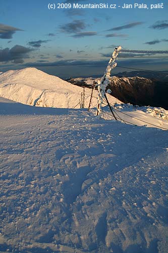 Sun was just a little above skyline and snow was nicely red