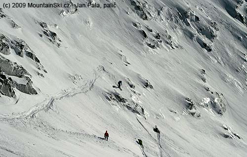 Skiing onto small rock